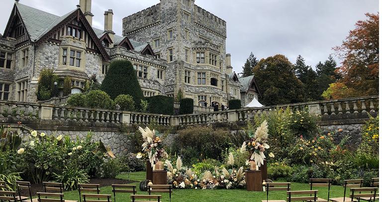 Wedding chairs arranged in front of Hatley Castle