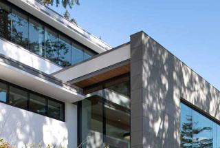 Dogwood Auditorium set on a hill beneath blue skies