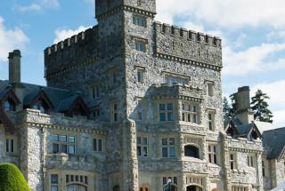 An exterior photo of Hatley Castle in the summer